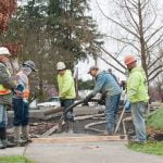 concrete finishing apprentices hard at work on the job