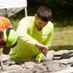 learning new skills while building a fire pit